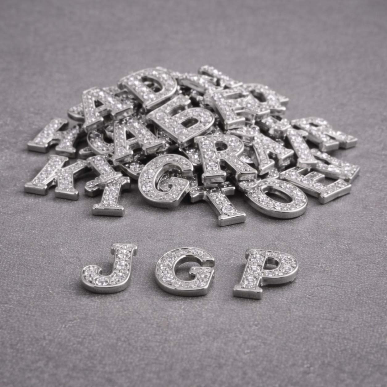 zwevende bedels alfabet